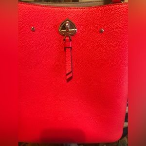 Kate Spade.  Excellent condition.  No marks or stains. Coral color.